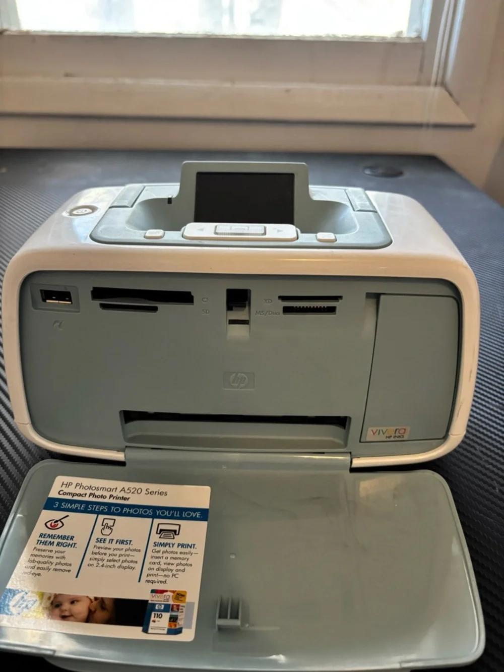 HP Photosmart A522 Portable Photo Printer in Light Blue and White